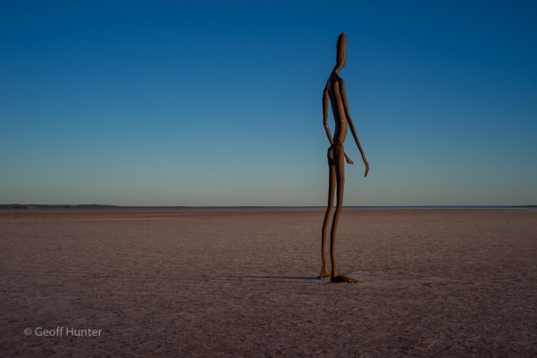 statue on Lake Ballard at Sunrise